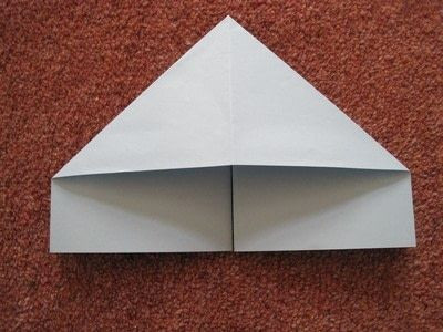 Lặp lại thao tác tạo hình tam giác ở góc đối diện