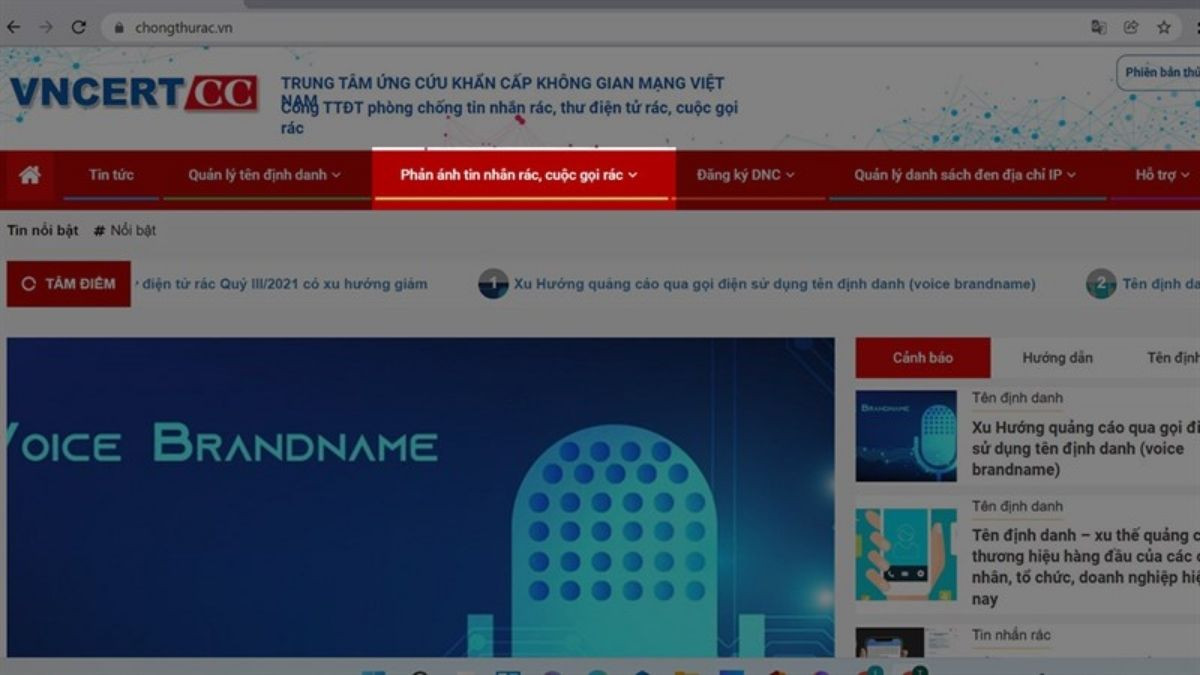 Người dùng đang nhấn nút "Phản ánh" trên giao diện website VNCERT để chặn cuộc gọi rác và tin nhắn không mong muốn bằng cách báo cáo.