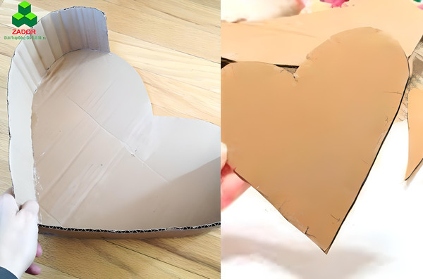 Thùng rác hình trái tim làm từ bìa carton độc đáo, thể hiện sự sáng tạo trong tái chế