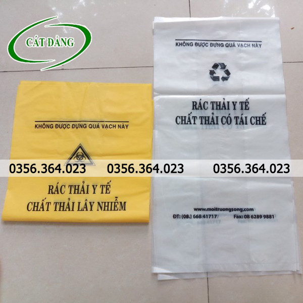 Túi rác y tế vàng và trắng